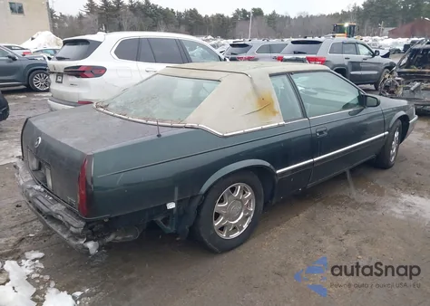 1997 Cadillac Eldorado Touring z USA, uszkodzony, nr VIN 1G6ET1291VU600043